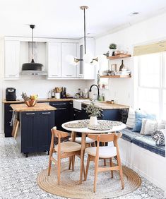 the kitchen is clean and ready to be used as a breakfast nook or seating area