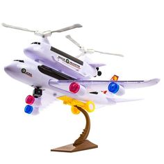 a white toy plane with lights on it's wings