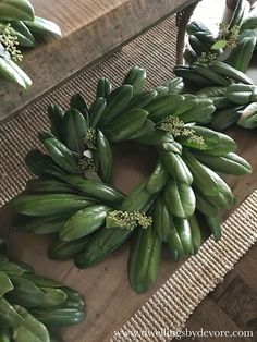 some green bananas are laying on the floor next to each other and ready to be picked up