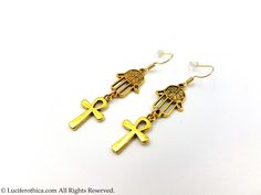 Mini Ankh Earrings - Ankh Symbols (2cmx1.3cm) - Hamsa Symbols. - 4cm total earrings length. - Earhooks in various material : Chose from dropdown box. - Gold colour. - Handmade. - Comes in a pair. Fast Worldwide Shipping More jewellery, accesoires, altar equipment and much more can be found at www.luciferothica.com © Luciferothica.com All Rights Reserved. Ankh-shaped Metal Earrings For Gift, Nickel Free Ankh Earrings For Gift, Ankh Shaped Metal Earrings For Gift, Nickel-free Ankh Earrings As Gift, Symbolic Gold Plug Earrings As Gifts, Symbolic Gold Plug Earrings For Gift, Nickel-free Ankh Gold Earrings, Handmade Gothic Gold Earrings, Adjustable Gold Jewelry For Halloween