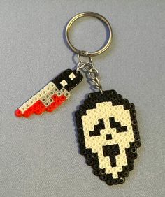 a keychain with an image of a skull on it