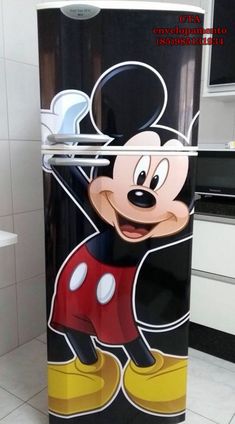 a mickey mouse refrigerator with the door open