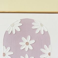 a painting with white flowers on a pink background