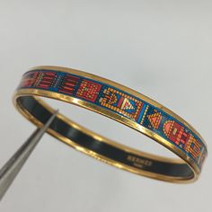 Vintage Hermes Cloisonne Bangle Bracelet. 10 millimeters wide. Fits small to medium wrist. This authentic vintage bracelet is in very good condition. No scratches on the enamel! Hermes Bangle, Green Bay Packers Shirts, Vintage Hermes, Fairytale Dress, Vintage Bracelet, Vintage Bracelets, Green Bay, Bangle Bracelet, Arm Band