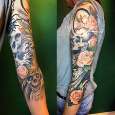 the arm is covered with tattoos and flowers