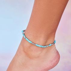 Brighten up your summer wardrobe with our Turquoise Bead Stretch Anklet! A vibrant way to liven up any look, this easy slip-on style anklet is the perfect beach accessory. Cheap Blue Anklets With Colorful Beads, Blue Beach Anklets, Vacation Strand Anklets, Trendy Adjustable Anklets For Vacation, Blue Anklets For Beach Season, Summer Festival Beachy Beaded Bracelets, Turquoise Beaded Anklets For Beach Season, Blue Beaded Bracelets For Summer Festival, Summer Bracelets With Tiny Beads