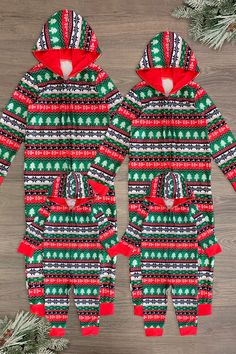 *Adult & child pajamas sold separately* Zip-up onesie style pajamas Red & green holiday Nordic print lends sweet, seasonal charm Soft fabric provides cozy all-night comfort Perfect for family Holiday pictures, or relaxing movie nights in Gift your family's wardrobe a seasonally sweet vibe with these Family Red & Green Winter Onesie Pajamas! It features a festive Nordic print for festive flair this is perfect for the holiday season. The front zipper allows for easy wear, while cuff styling ensure Family Holiday Pictures, Matching Family Christmas Pajamas, Sparkle In Pink, Family Pajama Sets, Nordic Print, Matching Christmas Pajamas, Cute Pajama Sets, Christmas Clothes, Onesie Pajamas