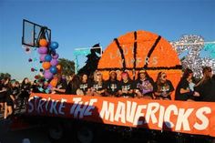 some people are sitting in the back of a truck with a sign on it that says strike the marvelouss