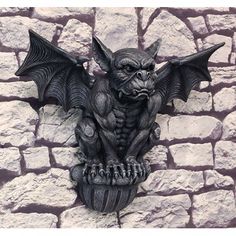 a gargoyle gargous on the side of a building