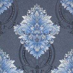 a blue and white wallpaper with an ornate design