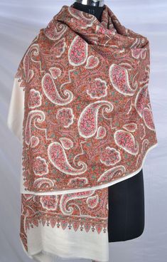 This Embroidered Pashmina Shawl is a luxurious and elegant accessory that can add a touch of sophistication to any outfit. The intricate paisley embroidery adds a beautiful and intricate detail to the shawl, making it a perfect accessory for formal events or even everyday wear. This embroidered pashmina shawl is a must-have accessory for anyone looking to add a touch of luxury and elegance to their wardrobe. The micro embroidery of this shawl mesmerizes the owner and any person wearing this shaw White Shawl For Traditional Ceremonies, White Pashmina Dupatta With Intricate Embroidery, White Shawl With Intricate Embroidery In Traditional Drape, White Pashmina Dupatta Shawl, White Shawl With Intricate Embroidery, White Pashmina Shawl With Intricate Embroidery, White Festive Pashmina Shawl, White Pashmina Shawl For Festive Occasions, Festive White Pashmina Shawl