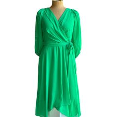 Lovely Dress For A Summertiime Wedding In Vibrant Green. Elegant Chiffon Wrap Dress For Spring, Formal Flowy Green Midi Dress, Green Chiffon Midi Dress For Formal Occasions, Formal Green Chiffon Midi Dress, Fitted Wrap Dress For Spring Wedding Guest, Green Summer Wrap Dress For Formal Occasions, Elegant Green Flowy Wrap Dress, Formal Green Summer Wrap Dress, Elegant Green Wrap Dress For Spring