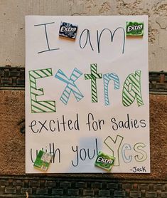 a sign on the side of a building that says i am extra excited for saddes with you yes