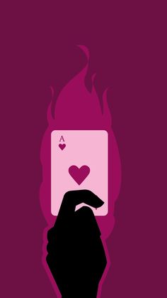 a person holding up a card in front of a pink background with hearts on it