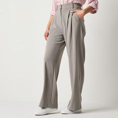 These by&by wide-leg trousers for juniors and women are the perfect chic tailored cut and fit for your silhouette. Made from a woven blend, these mid-rise pants have a pleated front darts and multiple pockets. Wear them with a button-down or a t-shirt.Front Style: Flat FrontClosure Type: ZipperFit: Classic FitPockets: 2 Front Slip Pockets, 2 Back Slip PocketsRise: Mid RiseFiber Content: 64% Polyester, 32% Rayon, 4% SpandexFabric Description: WovenInseam: 31 InLeg Style: Wide LegCare: Tumble Dry…