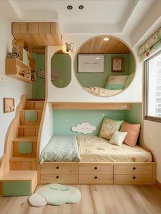 a small bedroom with stairs leading up to the bed and storage drawers underneath it,