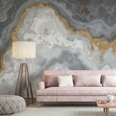 a living room with marble wallpaper and pink couch in front of a coffee table