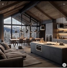 a large open kitchen and living room area in a mountain house with wood ceilinging