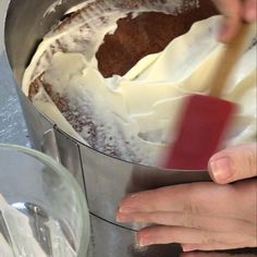 someone is mixing some food in a pot