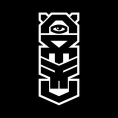 an eye is seen in the center of this black and white logo, which appears to be made up of geometric shapes