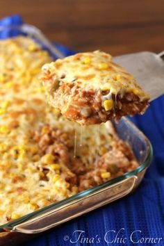 a casserole dish is being lifted with a spatula from the casserole