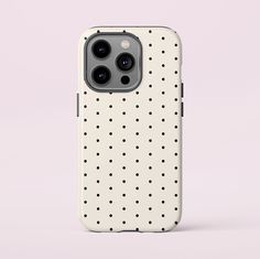 a white case with black dots on it