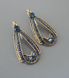 "Vintage Jewelry - Art Deco Earrings - Vintage Inspired - Gold Earrings - Sapphire Blue Earrings - Crystal Earrings - Bridal Earrings Stunning Art Deco inspired drops made up of sparkling deep Sapphire blue crystals set in gold plate. Fabulous design and deep blue color.  Lovely wedding or party earrings.  If you need multiples, please contact me. Chloe says, \"Wear it and feel fabulous!\" The earrings measure 2\" long from the top of the ear wire. Thanks for visiting Chloe's" Sapphire Blue Earrings, Gold Art Deco Earrings, Art Deco Drop Earrings, Earrings Sapphire, Vintage Inspired Earrings, Blue Crystal Earrings, Vintage Jewelry Art, Deco Earrings, Art Deco Necklace