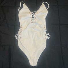 Women’s Fashion Nova Swimsuit Size Small. Color Is Off White With Rose Gold Detail. No Padding In The Breast Area. New! Never Worn. Trendy White Bodysuit For Beach Season, Trendy White Bodysuit For Vacation, White Summer Bodysuit For Party, White Summer Bodysuit For A Day Out, White Bodysuit For Summer Day Out, Fitted White Swimwear For Day Out, Fashion Nova Swimsuit, Swim Fashion, Gold Details