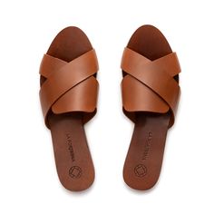 Our new Anna flat sandals made of leather are the perfect option to keep your feet cool on hot summer days.  *One size larger than usual is recommended.   La Portegna leather is vegetable tanned, with a unique blend of natural tannins and compounds from flowers and tree bark. The leather is treated with olive oil to nourish it, soften it and make it more robust.   This all-natural process has two benefits: it results in beautiful-looking leather that develops a unique "patina" over time; it lit Open Toe Leather Sandals With Woven Details, Brown Leather Slip-on Sandals, Summer Leather Sandals With Hand-tooled Details, Brown Woven Leather Slip-on Sandals, Elegant Brown T-strap Sandals With Buckle Closure, Tree Bark, Hot Summer, Flat Sandals, Summer Days