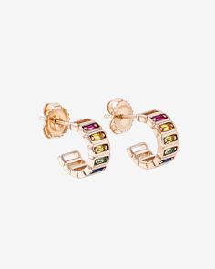 Elevate your style with these stunning mini hoops. Crafted with 18-karat gold, these earrings feature a sleek and modern design with a single row of horizontally placed rainbow sapphire baguettes. The mesmerizing sapphires add a touch of glamour to your look, making these earrings a perfect accessory for any occasion. Details 18k yellow gold or rose gold 0.67 carats of rainbow sapphire baguettes 12mm hoops 5.5mm width Ref: BAE793 Rainbow Sapphires, Suzanne Kalan, Elevate Your Style, Beauty Care, Or Rose, Modern Design, Sapphire, Jewelry Design, Sleek