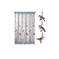 three birds are perched on the hooks in front of a shower curtain that is decorated with flowers and branches