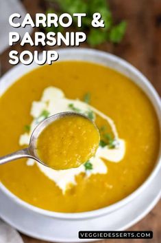 carrot and parsnip soup in a white bowl with a spoon