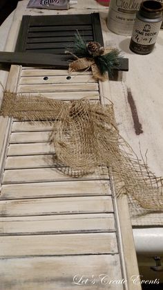 an old door is decorated with burlock and twine