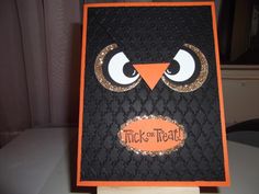 an orange and black owl card with the words trick or treat on it's face