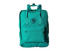 Fjallraven Re-Kanken - Bags : Emerald : The primary materials that compose this product contain a minimum of 20 percent recycled content. Constructed from 11 recycled plastic bottles, Fjällräven focuses on the environment with the Re-Kånken backpack. The Fjällräven SPIN DYE process reduces water consumption and minimizes impact. Large main compartment to hold all your daily essentials. Front zip pocket for additional storage. Side slip pocket for water bottle. Dual top handles with snap closure Re Kanken, Water Consumption, Kanken Backpack, Recycle Plastic Bottles, Fjallraven Kanken Backpack, Free Clothes, Recycled Plastic, Product Reviews, Plastic Bottles