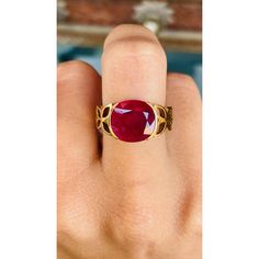 This is part of Chairish’s Fine Jewelry assortment.  Oval Cut Ruby Cocktail ring in 18K Gold which perfectly goes with your personality and also helps you to improve your energy and sensuality. Designed with oval cut ruby in center and metal engraving that makes it a perfect fit to wear it on your wedding or Christmas or any other occasions, you can style it with any of your basic outfit to give it a glam. This is a great bridesmaid, wedding or Christmas gift for anyone on your list.  PRODUCT DE Luxury Oval Ruby Ring With Polished Finish, Luxury Oval Ruby Ring With Gemstone, Luxury Oval Ruby Birthstone Ring, Gia Certified Ruby Ring, Fine Jewelry Ruby Ring With Polished Finish, Gia Certified Oval Ruby Ring Gift, Heirloom Oval Ruby Ring Gia Certified, Gia Certified Heirloom Oval Ruby Ring, Heirloom Oval Gia Certified Ruby Ring