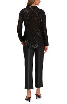 Glittery allover sequins illuminate this polished shirt that's ideal for a night on the town. 26" length (size X-Small) Split neck; spread collar Long sleeves 95% polyester, 5% spandex Machine wash, line dry Imported Glamorous Fitted Shiny Blouse, Elegant Long Sleeve Sequin Shirt, Glitter Blouse For Night Out In Fall, Shiny Tops For Night Out In Fall, Fall Glitter Blouse For Night Out, Glitter Blouse For Night Out, Shiny Top For Night Out In Fall, Fall Night Out Glitter Blouse, Embellished Long Sleeve Party Shirt