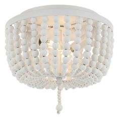 a white ceiling light with beads hanging from it