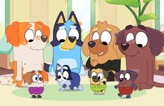 several cartoon dogs are standing together in the living room