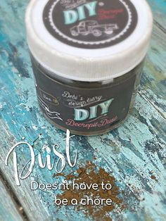 an old wooden table with a jar of diy paste sitting on top of it