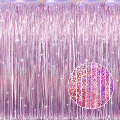 a pink background with fringes and a circle in the center, surrounded by stars