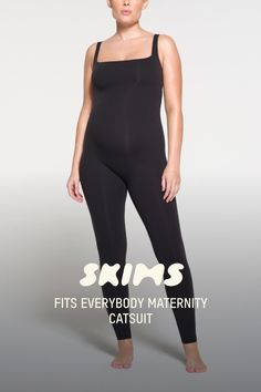 This one-and-done piece goes with everything, including your bump. Slip into the buttery softness of this catsuit made with two layers of our best-selling Fits Everybody fabric designed to stretch with your growing belly for an ultra-flattering fit and second skin feel. Features a built-in shelf bra with smooth underbust elastic, a chic square neck, and tank straps. Fits true to size. | SKIMS Maternity Catsuit (Bodysuit) | Black | Medium | Fits Everybody Maternity Catsuit, Catsuit Bodysuit, Growing Belly, Olivia Munn, Body Suit Outfits, Bodysuit Black, Black Xs, Shelf Bra, Maternity Wear