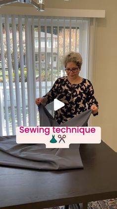 a woman standing in front of a table with a piece of cloth on it and the words sewing technique