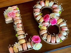 the letter e is made out of macaroons and flowers