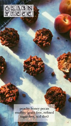 an image of granola cookies on a sheet of parchment paper with apples in the background