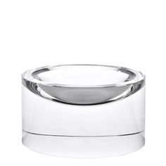 an empty glass container on a white background