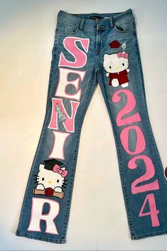 @xoticval makes these jeans she's on tik tok and Pinterest🫶🫶🫶 Senior Homecoming Jeans, Hello Kitty Senior, Homecoming Jeans Ideas, Homecoming Jeans, Senior Painted Jeans, Senior Pants, Aesthetic Late Night, Art Small Business