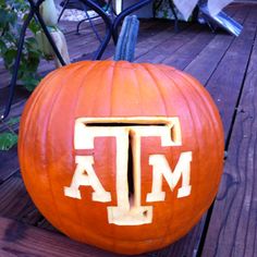 a pumpkin with the letter t on it