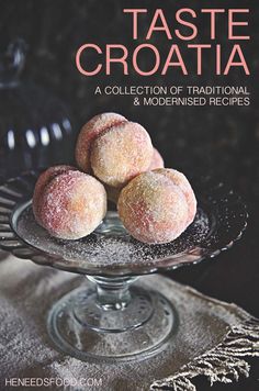 three powdered donuts sitting on top of a glass cake plate with the title, taste croatia