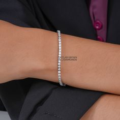 Full Eternity White Diamond Tennis Bracelet, Round Lab Grown Diamond Bracelet for Women, Handmade Party Wear Bracelet in 14K White Gold  *Stone: Lab Grown Diamond *Metal:  14k Solid Gold *Net Gold - 8.163 *       No. Of Diamond - 76 *        Bracelet Length - 6.5 Inches *Carat - 2.89 *Diamond color: White *       Silver weight: 8.163           *       Diamond Weight: 2.89          *      Handmade item Metal Finishing Available: 14k Solid Yellow Gold, 14k Sold Rose Gold and 14K Solid White Gold Elegant Flexible Tennis Bracelet For Formal Occasions, Flexible Tennis Bracelet For Formal Occasions, Elegant Flexible Tennis Bracelet For Wedding, Elegant Formal Sterling Silver Flexible Bracelet, Gold Gift, Tennis Bracelet Diamond, Tennis Bracelet, White Silver, White Diamond